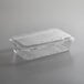 A 3 lb. clear plastic clamshell produce container with a lid.
