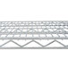 A Metro Super Erecta chrome wire shelf with a grid on top.