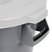 A close-up of a Continental Huskee gray trash can with a gray lid.