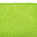 A close up of a lime green Unger SmartColor microfiber cloth with a white edge.