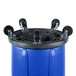 A blue Rubbermaid recycling can with wheels.