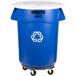 A blue Rubbermaid BRUTE trash can with white lid and wheels.