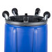 A blue drum with black wheels.