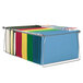 A Smead file with blue and green file folders holding colorful files in a wire rack.