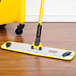 A yellow Rubbermaid Quick Connect Microfiber Mop Frame.