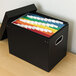 A black box with colorful files in it.