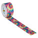 A roll of tie dye tape with colorful patterns.