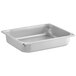 A Hatco stainless steel half size food pan on a counter.