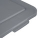 A close-up of a grey Rubbermaid Brute square plastic lid.