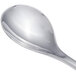 A close-up of a Chef & Sommelier stainless steel soup spoon with a silver handle.