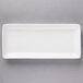 A white rectangular 10 Strawberry Street porcelain coupe platter on a gray background.