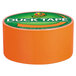 A roll of Duck Tape with a neon orange label.