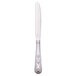 A Libbey stainless steel dinner knife with a fluted design on the handle.
