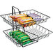 A Cal-Mil wire rack with two rectangular wire baskets holding snacks and candy bars on a counter.