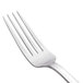 A Libbey Lady Astor stainless steel dessert fork with a silver handle.