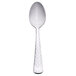 A Libbey stainless steel demitasse spoon with a white handle and silver spoon.