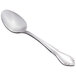 A Libbey stainless steel dessert spoon with a handle.