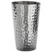 A close-up of an American Metalcraft double-wall hammered stainless steel tumbler.