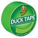 A neon green Duck Tape roll with white text.