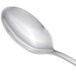 An Arcoroc stainless steel iced tea spoon with a silver handle.