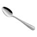 A Choice Milton stainless steel serving spoon with a silver handle and spoon.