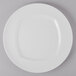 A Schonwald continental white porcelain plate with a white rim.