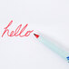 The word "hello" written in red with an Expo Vis-a-Vis red pen.