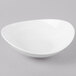 A Schonwald white porcelain bowl with a small rim on a gray background.