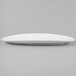 A white rectangular Schonwald porcelain platter on a gray surface.