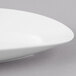 A Schonwald white porcelain long tray with curved edges.