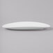 A white oval Schonwald porcelain platter on a gray background.