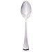 A silver Libbey dessert spoon with a handle.