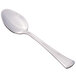 A silver spoon with a long handle.