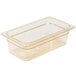 A clear Carlisle plastic food pan with a gold rim.