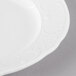 A Schonwald Continental white porcelain oval platter with a decorative design on it.