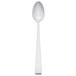 A stainless steel spoon with a white handle.