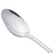 A World Tableware Resplendence dessert spoon with a silver handle.
