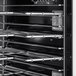 A black and white Vulcan commercial convection oven in a professional kitchen.