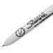 A white Sharpie Ultra-Fine Point Retractable Permanent Marker with black writing.