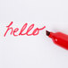 The word "hello" written in red with a Sharpie King Size red marker.