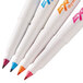 A group of Expo dry erase markers with white barrels and different colored caps.