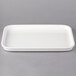 A white rectangular Villeroy & Boch porcelain serving plate with a handle.