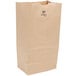 A brown Duro paper bag with black text that reads "20 lb."