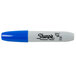 A close up of a blue and white Sharpie Chisel Tip marker.