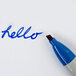 A close up of a blue Sharpie marker writing "hello" on white paper.