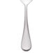 The Master's Gauge stainless steel dessert spoon by World Tableware with a white handle.