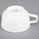 A white porcelain Villeroy & Boch tea cup with a handle.