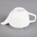 A white Villeroy & Boch porcelain coffeepot with a handle.