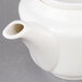 A white Villeroy & Boch porcelain coffeepot with a lid.