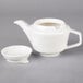 A white Villeroy & Boch porcelain coffeepot on a gray surface.